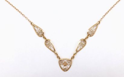 NECKLACE in 18K yellow gold filigree retaining...