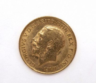 null PIECE en or jaune 900 millièmes présentant à l'avers le buste du roi Georges...