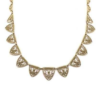 NECKLACE in 18K yellow gold retaining filigree...