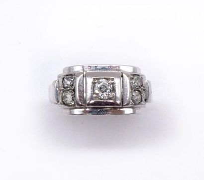 null RING in platinum and 18K white gold holding five antique cut diamonds. French...