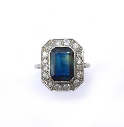 null ART DECO RING in 18K white gold holding a sapphire of approximately 2 carats...