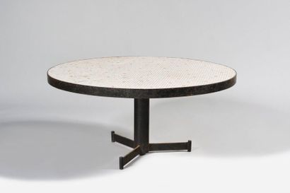 WORK OF THE 1960's Pedestal table with circular...