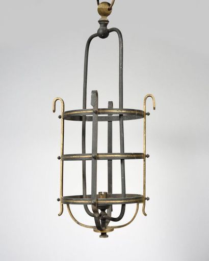null WORK OF THE 1940's Wrought iron cylindrical lantern, gilded net Missing glass...