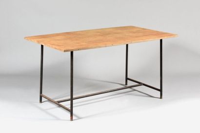 null WORK OF THE 1950's Table with oak veneer top with slightly rounded long sides...