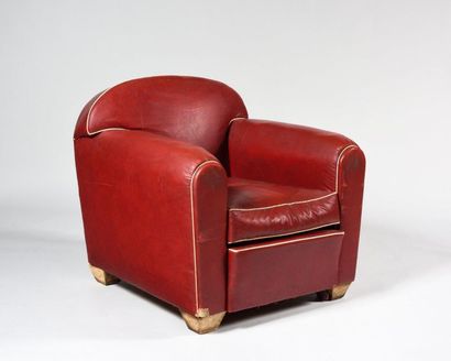 WORK OF THE 1950S Club armchair in red moleskin...