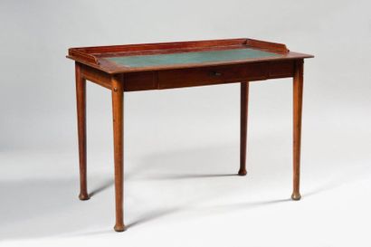 null ENGLISH WORK TOWARDS 1900 Rectangular mahogany veneered writing table with a...