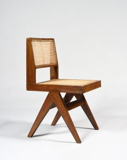 null PIERRE JEANNERET (1896-1967) Solid teak chair with square caned seat and backrest...