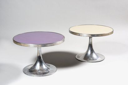 null WORK OF THE 1970s Pair of low pedestal tables with circular swivelling trays...