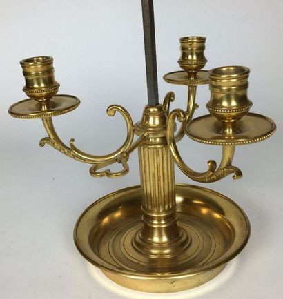 null LAMP BOUILLOTE in gilt bronze with three moving light arms. Sheet metal lampshade....