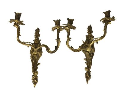 null Pair of ormolu and chiselled bronze sconces with two moving light arms with...