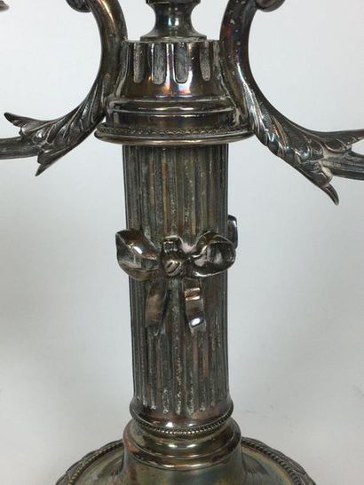 null Pair of silver-plated bronze candelabra with two moving light arms. The fluted...