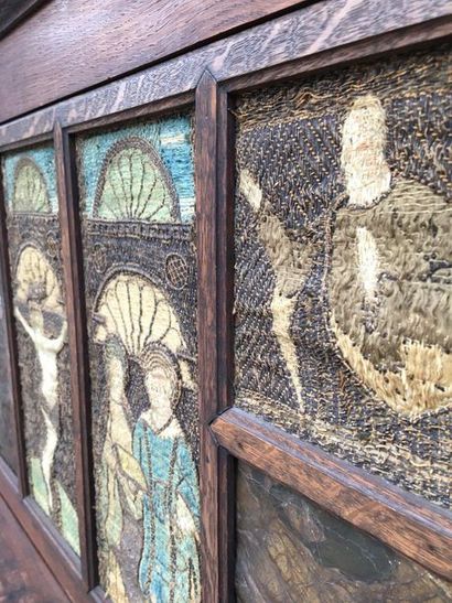 null PANELS mounted in a piece of furniture comprising four embroideries in polychrome...