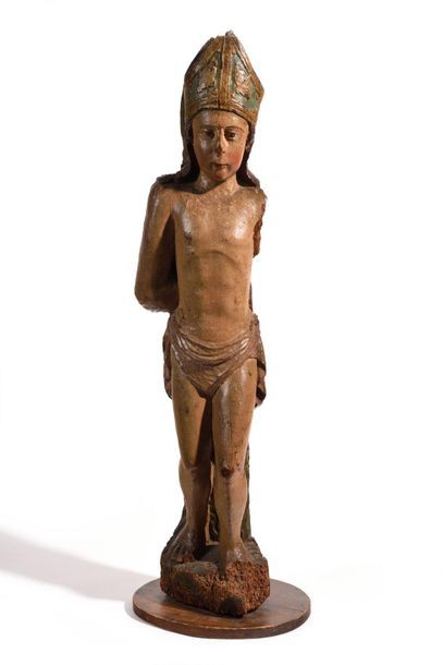 null SAINT EVEQUE in carved and polychromed wood. Standing with his head down, naked...