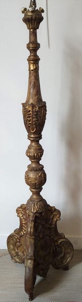 null Large Candelabra in carved and gilded wood, shaft turned into a sphere and baluster...