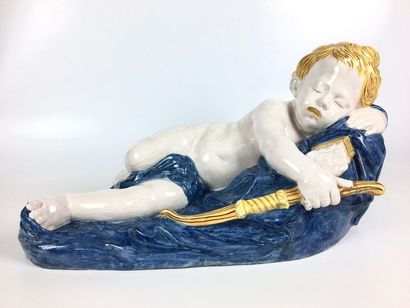 null NEVERS (In the taste of) Large earthenware figurine representing a sleeping...