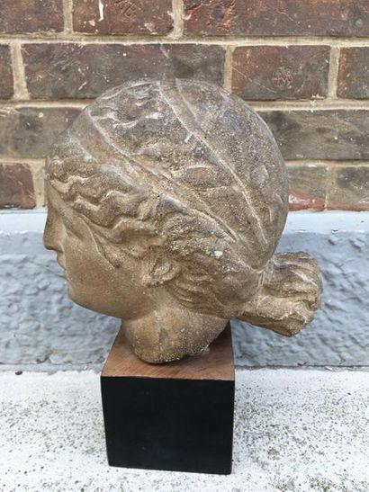 null From THE ANTIQUE FEMALE STONE HEAD. Wooden base. Height without the base : 20...