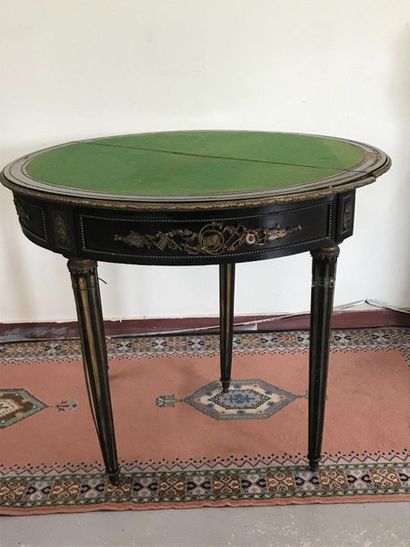null GAME TABLE in the shape of a half-moon in blackened wood and gilt bronze. 

Napoleon...