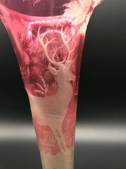 null Bohemian glass cornet vase lined and engraved with a deer decoration. 

TBE....