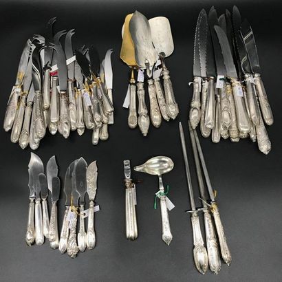 null Collection of cheese knives, butter knives, bread knives, spoons, bottle openers....
