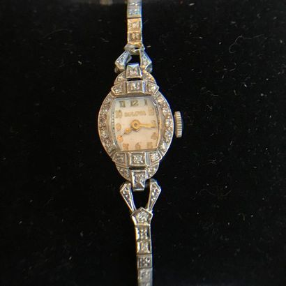 null Small Bulova ladies' watch, platinum case set with small diamonds. 

PB: 16.29g

Length:...