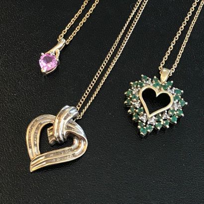 null Set of three PENDANTS in 10k yellow gold in the shape of a heart on plated chains....