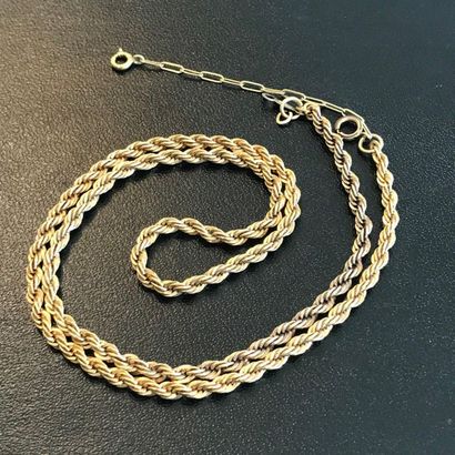 null 14k yellow gold coiled mesh necklace with safety clasp.

Length. 42 cm

PB:...