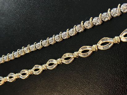 null Set of two 10k yellow gold bracelets decorated with small diamonds all around....