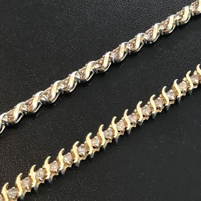 null Set of two 14k yellow gold bracelets with small diamonds all around. 

Safety...