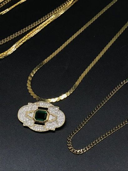 null Set of three gold-plated metal necklaces, an enamelled and crystal ring, and...