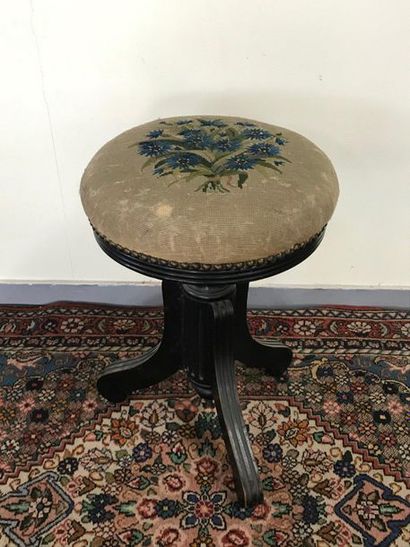 Blackened wooden piano stool with screws
