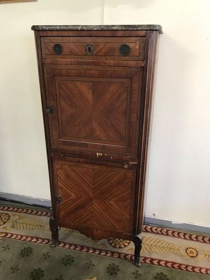 Small piece of furniture opening by two doors,...