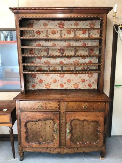 null Walnut china cabinet with light and dark wood inlays. 

It opens through two...