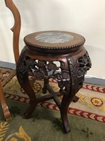 null Two Chinese carved wooden saddles with openwork decoration, marble top. 

Height...