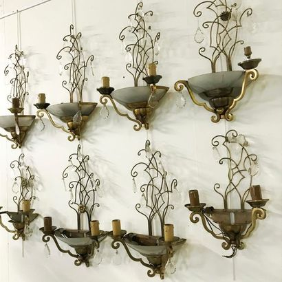 null In the taste of Maison Bagues

Suite of six brass wall lights and pendants and...