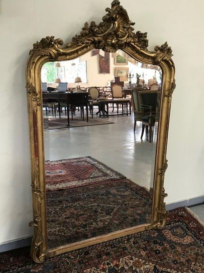 null MIRROR

In the Louis XV style in wood and gilded stucco with decoration surmounted...