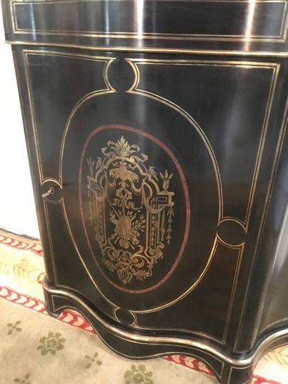 null A Napoleon III pedestal cabinet in blackened wood with gilded brass fillets...