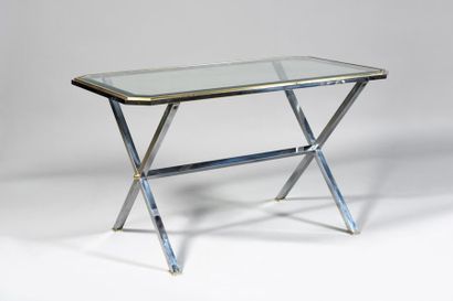 null 1980S WORK

Rectangular table with bevelled glass top with double stepped brass...