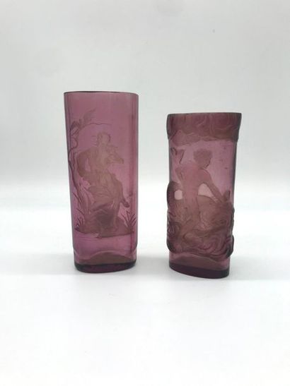 null Two purple glass vases with engraved decoration:

- one in relief with Apollo...