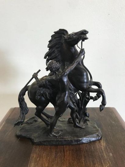 null Marly horse in bronze with brown patina after Guillaume Cousou.

19 cm