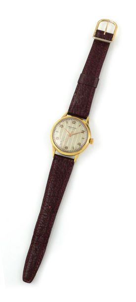null MOVADO Circa 1960. Men's wristwatch in yellow gold plated, gold dial, baton...