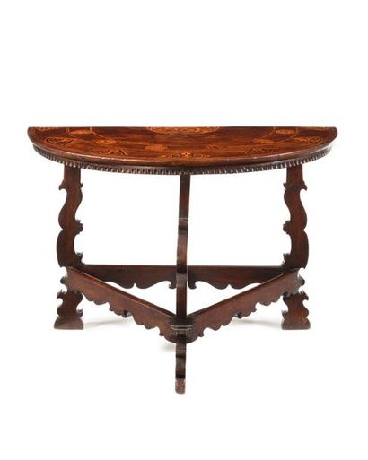 null Pair of half-moon brackets forming a walnut table, triangular base with cut-out...