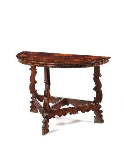 null Pair of half-moon brackets forming a walnut table, triangular base with cut-out...