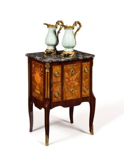 null Small chest of drawers in marquetry of trophy music, the tripartite front with...