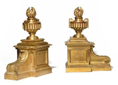 null Gilded bronze chenets heads decorated with neoclassical vases and scrolling...
