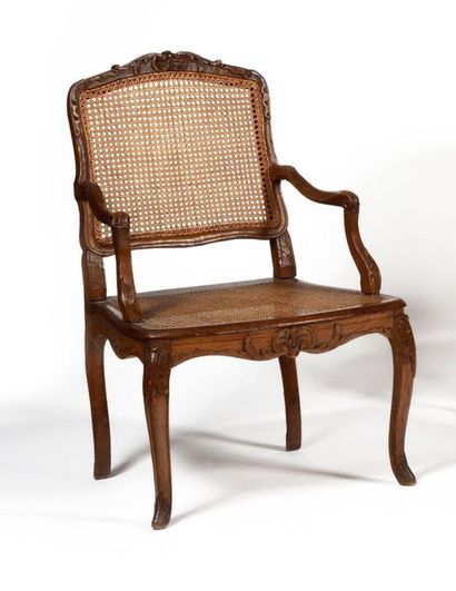 null Caned beech armchair with flat back, decorated with grenades in leaf cartridges,...