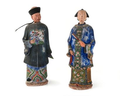 null China, Guangzhou Pair of painted terracotta figures representing a woman holding...