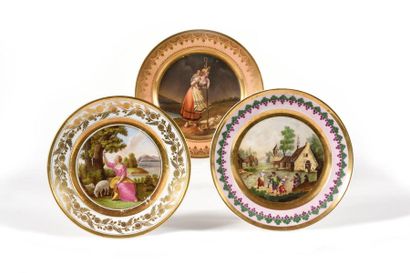 null Paris Three porcelain plates with polychrome decoration of shepherdesses in...