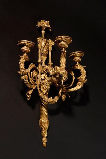  Pair of important arms of light in chased and gilded bronze (two tones of gold),...