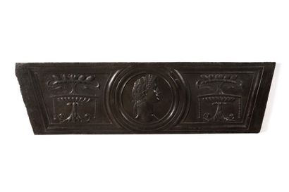 null Large black stone lintel carved in bas-relief of an emperor's profile in a medallion...