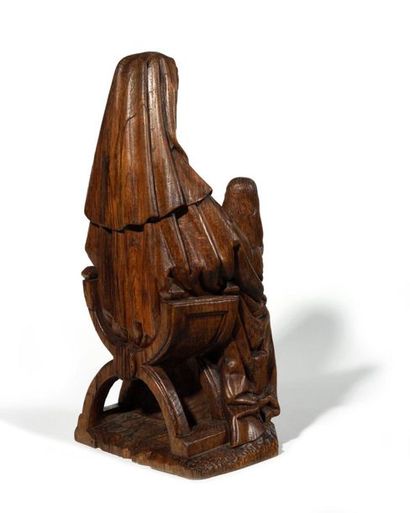 null Sainte Anne enseignante en chêne sculpté en ronde-bosse. Assise sur un fauteuil...